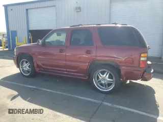 2002 GMC Yukon Denali z VIN 1GKEK63U02J118522, wystawiony jako Copart lot #52031995 z przebiegiem 166 332 mil mil oraz Szkoda całkowita • Salvage title. Historia ofert i sprzedaży dostępna na DreamBid. Obrazek 2.