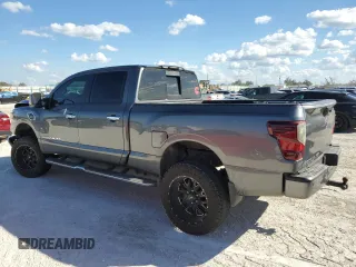 2016 Nissan Titan XD Platinum Reserve with VIN 1N6BA1F20GN516048, listed as a Copart auction lot 77580474 with 145,264 mi miles and Salvage Title. Bid and sale history available at carsss.com. Image 2.