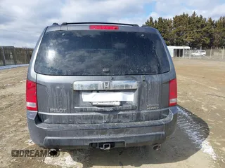 2011 Honda Pilot Touring with VIN 5FNYF4H98BB016012, listed as a IAAI auction lot 41634844 with 202,160 mi miles. Bid and sale history available at carsss.com. Image 16.