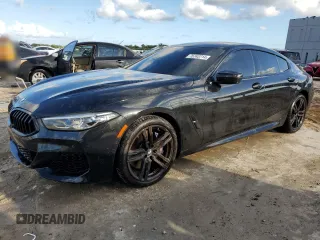 2024 BMW 8 Series 840i with VIN WBAGV2C07LCE26407, listed as a Copart auction lot 76743714 with 44,037 mi miles and Salvage Title. Bid and sale history available at carsss.com. Image 1.