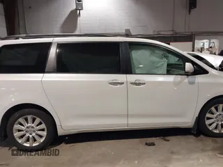 2011 Toyota Sienna XLE with VIN 5TDDK3DC8BS013015, listed as a IAAI auction lot 41445174 with 127,109 mi miles. Bid and sale history available at carsss.com. Image 13.