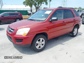 2009 Kia Sportage LX with VIN KNDJE723897599966, listed as a IAAI auction lot 42107627 with 118,512 mi miles. Bid and sale history available at carsss.com. Image 2.