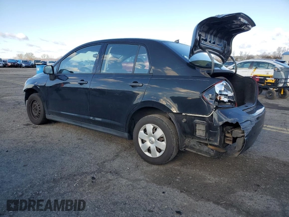 2010 Nissan Versa 1.6 with VIN 3N1CC1AP9AL352264, listed as a Copart auction lot 87299774 with 147,472 mi miles and Salvage Title. Bid and sale history available at carsss.com. Image 2.