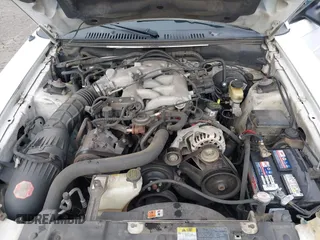 2004 Ford Mustang Deluxe with VIN 1FAFP446X4F134860, listed as a IAAI auction lot 41755643 with 174,410 mi miles. Bid and sale history available at carsss.com. Image 10.