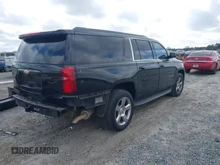 2016 Chevrolet Suburban LT with VIN 1GNSCHKC4GR444534, listed as a IAAI auction lot 41554353 with 131,196 mi miles. Bid and sale history available at carsss.com. Image 4.