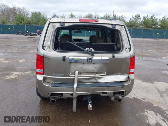 2009 Honda Pilot EX-L with VIN 5FNYF48569B002035, listed as a IAAI auction lot 41838347 with 198,849 mi miles. Bid and sale history available at carsss.com. Image 17.
