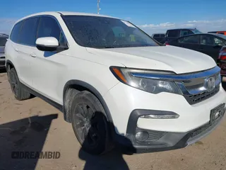 2019 Honda Pilot EX-L with VIN 5FNYF5H59KB017415, listed as a IAAI auction lot 41340852 with 125,433 mi miles and . Bid and sale history available at carsss.com. Image 1.