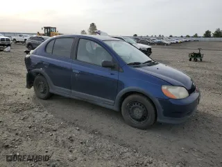 2001 Toyota ECHO with VIN JTDBT123110184931, listed as a Copart auction lot 52758615 with 229,308 mi miles and Salvage Title. Bid and sale history available at carsss.com. Image 4.