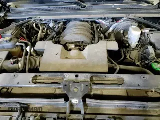 2015 Chevrolet Tahoe Commercial with VIN 1GNSK2EC4FR718793, listed as a Copart auction lot 84749724 with 122,342 mi miles and Salvage title. Bid and sale history available at DreamBid. Image 14.