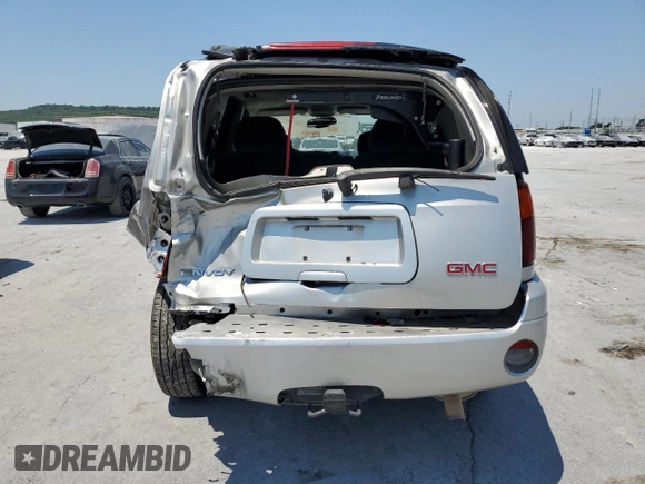 2007 GMC Envoy SLT with VIN 1GKDS13S472262069, listed as a Copart auction lot 59224264 with 126,464 mi miles and Salvage Title. Bid and sale history available at carsss.com. Image 6.
