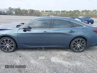 2022 Toyota Avalon Touring z VIN 4T1HZ1FB3NU088304, wystawiony jako IAAI lot #36419998 z przebiegiem 14 956 mil mil oraz . Historia ofert i sprzedaży dostępna na DreamBid. Obrazek 13.