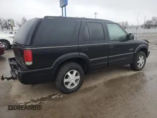 2000 Oldsmobile Bravada z VIN 1GHDT13W5Y2311819, wystawiony jako Copart lot #44839145 z przebiegiem 163 427 mil mil oraz Tytuł czysty. Historia ofert i sprzedaży dostępna na DreamBid. Obrazek 3.