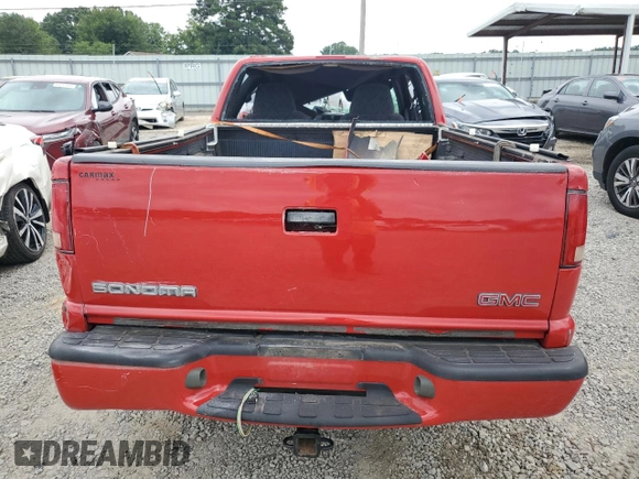 1999 GMC Sonoma SLS with VIN 1GTCS1947XK505373, listed as a Copart auction lot 64290564 with 0 mi miles and Non Repairable. Bid and sale history available at carsss.com. Image 6.