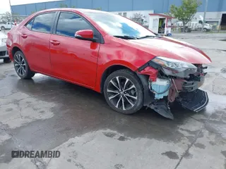 2017 Toyota Corolla L z VIN 5YFBURHE3HP715325, wystawiony jako IAAI lot #41804657 z przebiegiem 74 648 mil mil oraz . Historia ofert i sprzedaży dostępna na DreamBid. Obrazek 1.