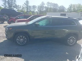 2019 Jeep Cherokee Latitude Plus with VIN 1C4PJMLB4KD418282, listed as a IAAI auction lot 42020995 with 58,000 mi miles and . Bid and sale history available at DreamBid. Image 14.
