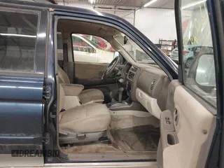 2002 Mitsubishi Montero XLS z VIN JA4MT31R92P011736, wystawiony jako IAAI lot #41920177 z przebiegiem 207 009 mil mil oraz . Historia ofert i sprzedaży dostępna na DreamBid. Obrazek 5.