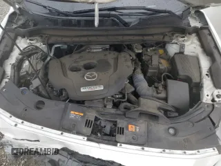 2021 Mazda CX-5 Signature with VIN JM3KFBEY3M0410998, listed as a Copart auction lot 54868885 with 73,207 mi miles and Salvage Title. Bid and sale history available at carsss.com. Image 12.