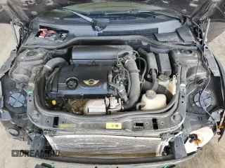 2014 MINI Convertible S with VIN WMWZP3C55ET706573, listed as a Copart auction lot 52325705 with 125,076 mi miles and Salvage Title. Bid and sale history available at DreamBid. Image 11.