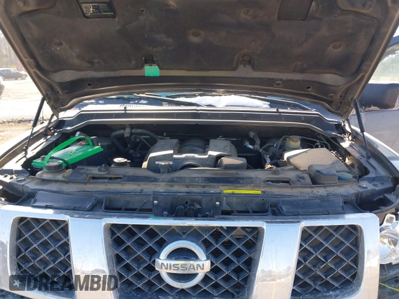 2006 Nissan Titan LE z VIN 1N6AA07B46N530408, wystawiony jako IAAI lot #41381403 z przebiegiem 259 376 mil mil oraz . Historia ofert i sprzedaży dostępna na DreamBid. Obrazek 10.