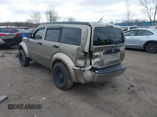 2007 Dodge Nitro SLT z VIN 1D8GU58K97W700047, wystawiony jako IAAI lot #41805822 z przebiegiem 186 604 mil mil oraz . Historia ofert i sprzedaży dostępna na DreamBid. Obrazek 3.
