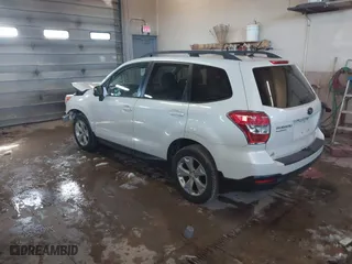 2015 Subaru Forester 2.5i Premium with VIN JF2SJADCXFH568428, listed as a IAAI auction lot 41876284 with 138,864 mi miles. Bid and sale history available at carsss.com. Image 3.