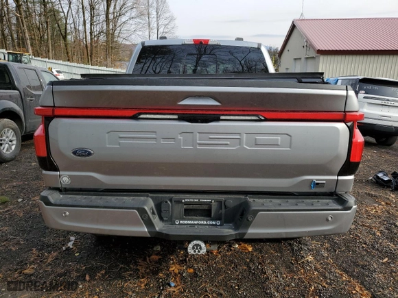 2022 Ford F-150 Lightning Pro with VIN 1FT6W1EVXNWG04534, listed as a Copart auction lot 78360484 with 0 mi miles and Salvage Title. Bid and sale history available at carsss.com. Image 6.