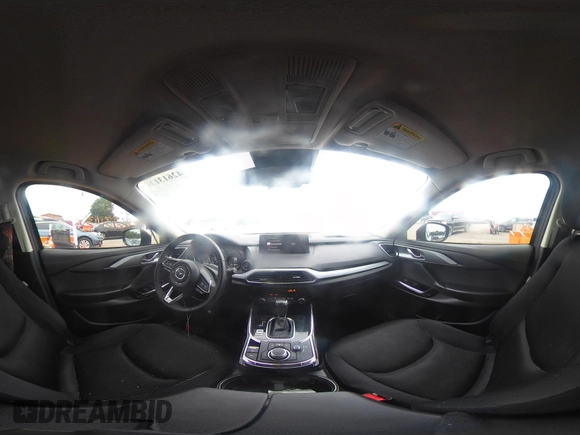 2021 Mazda CX-9 Sport with VIN JM3TCABY6M0522352, listed as a IAAI auction lot 42613136 with 106,167 mi miles and . Bid and sale history available at DreamBid. Image 18.