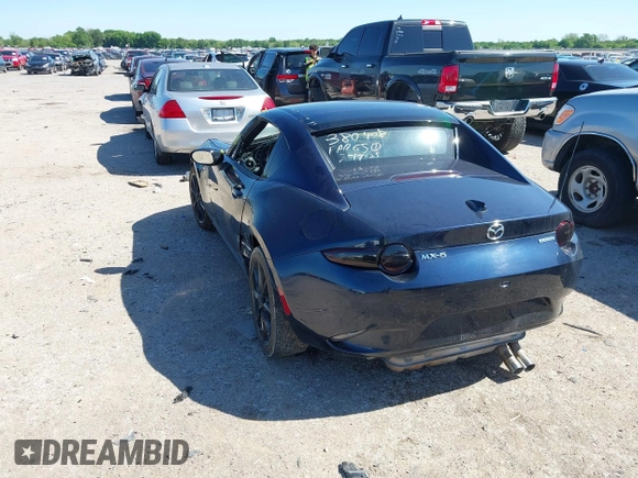 2021 Mazda MX-5 Miata Grand Touring with VIN JM1NDAM7XM0455743, listed as a IAAI auction lot 42067373 with 28,255 mi miles and . Bid and sale history available at DreamBid. Image 3.