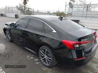 2022 Honda Civic Sedan Touring with VIN 2HGFE1F91NH308547, listed as a IAAI auction lot 41882514 with 39,249 mi miles. Bid and sale history available at carsss.com. Image 3.