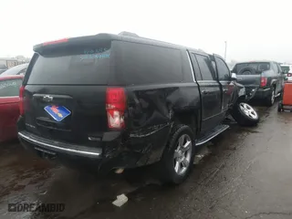2017 Chevrolet Suburban Premier with VIN 1GNSCJKCXHR312158, listed as a IAAI auction lot 40399105 with 150,560 mi miles. Bid and sale history available at carsss.com. Image 4.