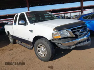 2000 Ford F-150 z VIN 2FTPX17LXYCA23919, wystawiony jako IAAI lot #41625192 z przebiegiem 141 028 mil mil oraz . Historia ofert i sprzedaży dostępna na DreamBid. Obrazek 1.