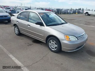 2001 Honda Civic LX with VIN 2HGES16511H554168, listed as a IAAI auction lot 42009621 with 163,801 mi miles. Bid and sale history available at carsss.com. Image 1.
