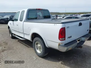 1997 Ford F-150 XL with VIN 1FTEX18L3VKB96680, listed as a IAAI auction lot 41928286 with 171,295 mi miles. Bid and sale history available at carsss.com. Image 3.