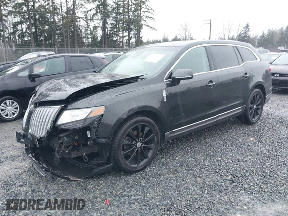2010 Lincoln MKT EcoBoost with VIN 2LMHJ5AT7ABJ04443, listed as a IAAI auction lot 41657143 with 112,902 mi miles and . Bid and sale history available at DreamBid. Image 2.
