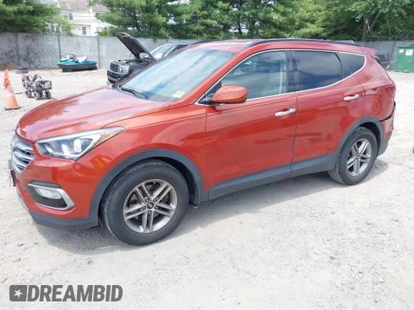 2017 Hyundai Santa Fe 2.4L z VIN 5XYZUDLB1HG463416, wystawiony jako IAAI lot #42546637 z przebiegiem 81 963 mil mil oraz . Historia ofert i sprzedaży dostępna na DreamBid. Obrazek 17.