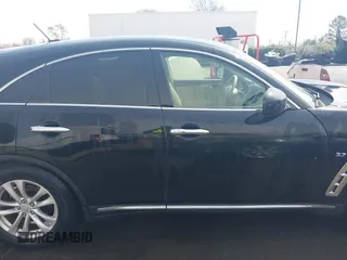 2017 Infiniti QX70 with VIN JN8CS1MW0HM414433, listed as a IAAI auction lot 41791003 with 105,946 mi miles and . Bid and sale history available at DreamBid. Image 13.