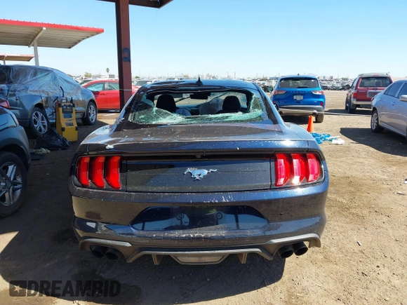 2021 Ford Mustang EcoBoost with VIN 1FA6P8TH2M5104154, listed as a IAAI auction lot 41869810 with 15,561 mi miles and . Bid and sale history available at DreamBid. Image 15.