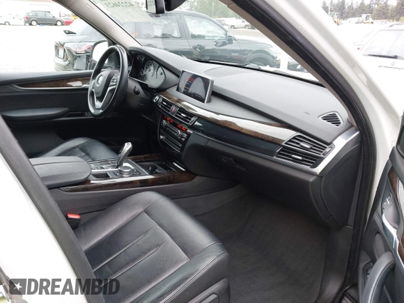 2016 BMW X5 xDrive40e z VIN 5UXKT0C55G0S77047, wystawiony jako IAAI lot #42224623 z przebiegiem 102 611 mil mil oraz . Historia ofert i sprzedaży dostępna na DreamBid. Obrazek 5.