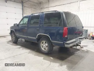 1999 Chevrolet Tahoe Z71 z VIN 1GNEK13R8XJ523049, wystawiony jako IAAI lot #41992101 z przebiegiem 180 169 mil mil oraz . Historia ofert i sprzedaży dostępna na DreamBid. Obrazek 3.