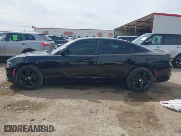 2015 Dodge Charger SXT z VIN 2C3CDXHG7FH777845, wystawiony jako IAAI lot #41791185 z przebiegiem 109 978 mil mil oraz . Historia ofert i sprzedaży dostępna na DreamBid. Obrazek 14.