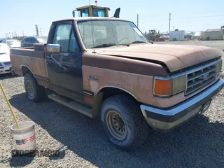 1987 Ford F-150 with VIN 1FTEF14N8HPB08224, listed as a IAAI auction lot 42047520 with 72,977 mi miles. Bid and sale history available at carsss.com. Image 1.