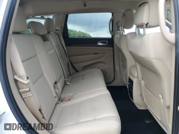 2019 Jeep Grand Cherokee Laredo E with VIN 1C4RJFAG8KC778860, listed as a Copart auction lot 56863425 with 57,813 mi miles and Salvage title. Bid and sale history available at DreamBid. Image 11.