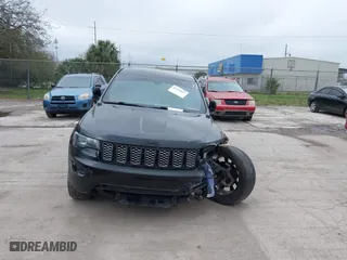 2018 Jeep Grand Cherokee Laredo E with VIN 1C4RJFAG7JC312948, listed as a IAAI auction lot 41624027 with 116,763 mi miles. Bid and sale history available at carsss.com. Image 13.