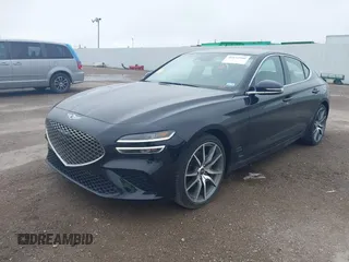 2023 Genesis G70 2.0T z VIN KMTG34TA5PU123377, wystawiony jako IAAI lot #41632566 z przebiegiem 12 184 mil mil oraz . Historia ofert i sprzedaży dostępna na DreamBid. Obrazek 2.
