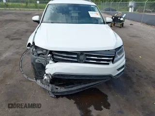 2021 Volkswagen Tiguan SE z VIN 3VV2B7AX5MM057743, wystawiony jako IAAI lot #42471192 z przebiegiem 80 133 mil mil oraz . Historia ofert i sprzedaży dostępna na DreamBid. Obrazek 6.