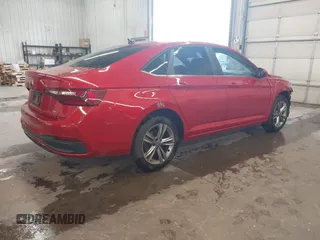 2023 Volkswagen Jetta SE with VIN 3VWEM7BUXPM057216, listed as a IAAI auction lot 42303031 with 30,591 mi miles and . Bid and sale history available at DreamBid. Image 4.