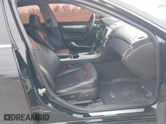 2013 Cadillac CTS Performance with VIN 1G6DJ5E37D0156897, listed as a IAAI auction lot 41359292 with 152,051 mi miles and . Bid and sale history available at DreamBid. Image 5.