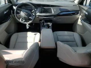 2023 Cadillac XT4 FWD Luxury with VIN 1GYAZAR46PF134602, listed as a Copart auction lot 54684865 with 13,221 mi miles and Salvage title. Bid and sale history available at DreamBid. Image 8.
