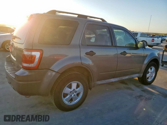 2011 Ford Escape XLT with VIN 1FMCU0D75BKC22917, listed as a Copart auction lot 48531065 with 198,854 mi miles and Salvage Title. Bid and sale history available at carsss.com. Image 3.
