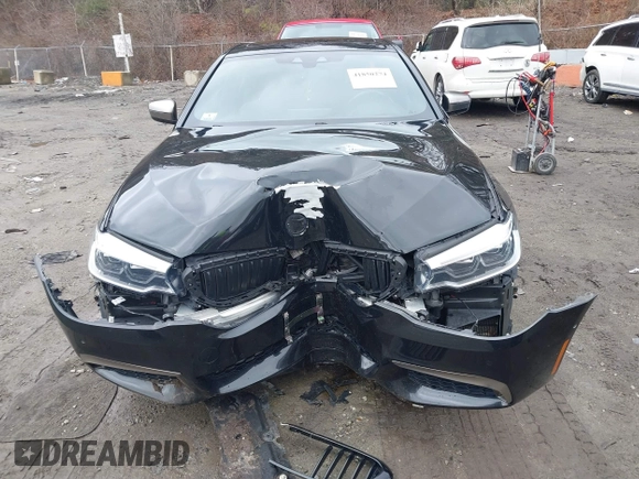 2020 BMW 5 Series M550i xDrive z VIN WBAJS7C09LCD45078, wystawiony jako IAAI lot #41850274 z przebiegiem 75 613 mil mil oraz . Historia ofert i sprzedaży dostępna na DreamBid. Obrazek 12.